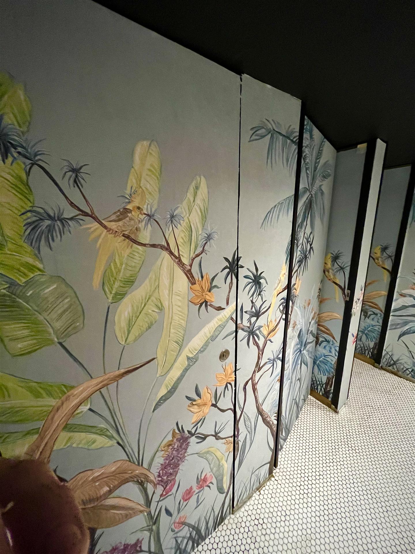 Botanical wallpaper on restaurant toilet cubicle doors, London